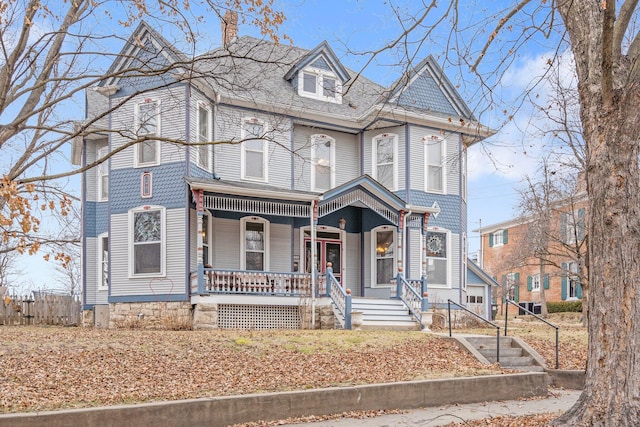 victorian-style house with a porch