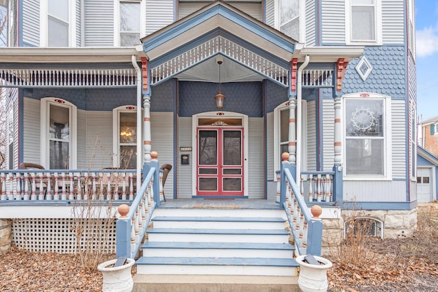 doorway to property featuring a porch