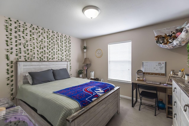 bedroom with light carpet