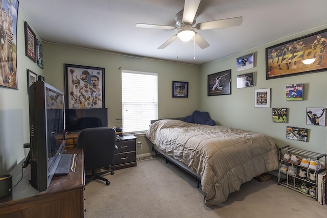 carpeted bedroom with ceiling fan