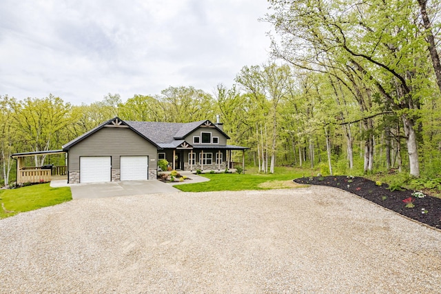 4503 E Mcgee Rd, Columbia, MO 65202 - single story home with a garage, a front lawn, covered porch, stone siding, and gravel driveway