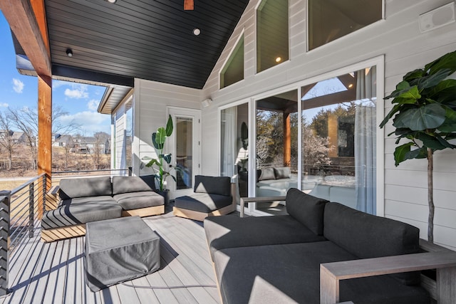 wooden terrace featuring outdoor lounge area