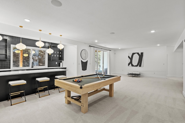 recreation room with baseboards, recessed lighting, and light colored carpet