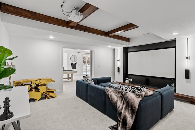 cinema room featuring recessed lighting, beamed ceiling, and light colored carpet