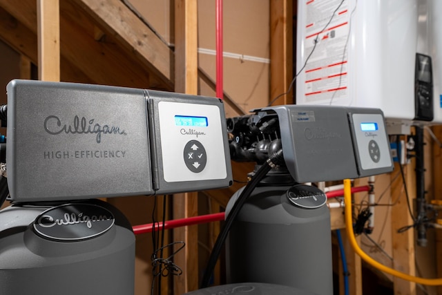 utility room with water heater