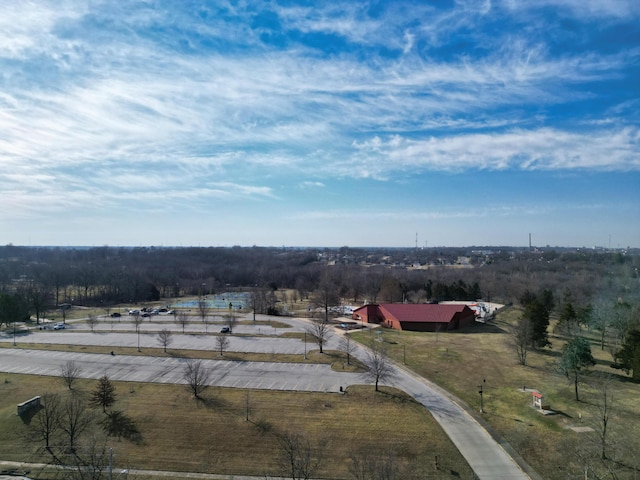 birds eye view of property with a rural view