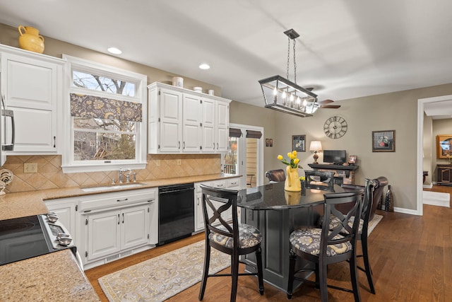 kitchen with a sink, white cabinetry, electric stove, dishwasher, and dark wood finished floors