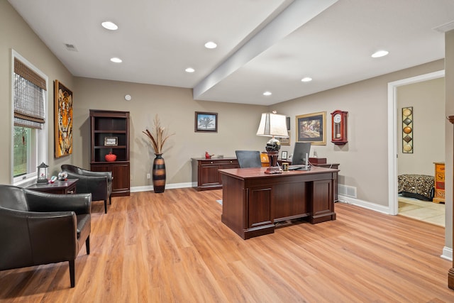 office space featuring recessed lighting, light wood-style flooring, and baseboards