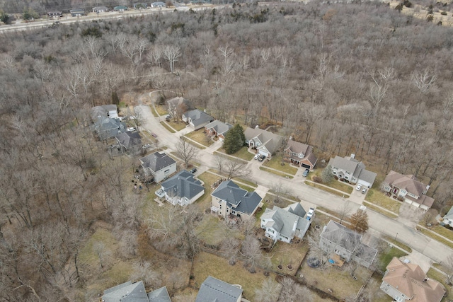 birds eye view of property with a residential view