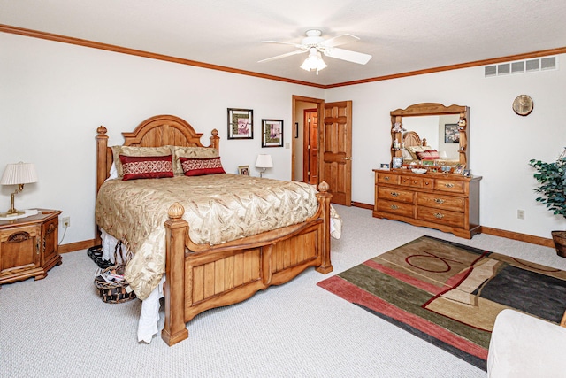 bedroom with crown molding, carpet, and ceiling fan