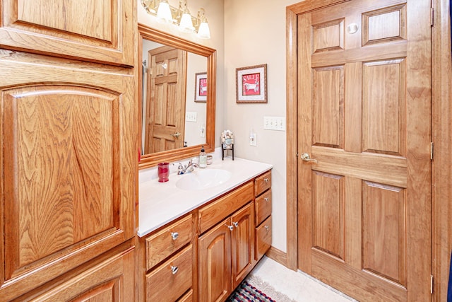 bathroom with vanity and tile patterned floors