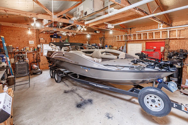 garage with a workshop area