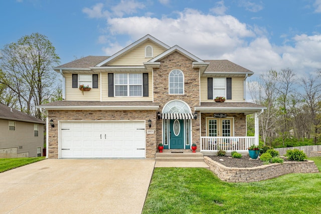 view of front of house featuring concrete driveway, a garage, roof with shingles, a porch, and a front yard