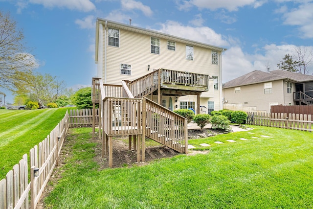 rear view of house featuring stairs and a deck