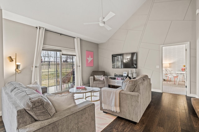 living area with high vaulted ceiling, wood finished floors, and a ceiling fan