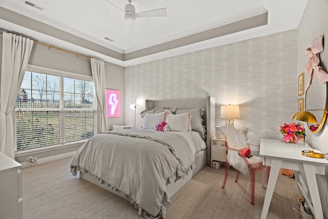 bedroom with carpet floors, wallpapered walls, and visible vents