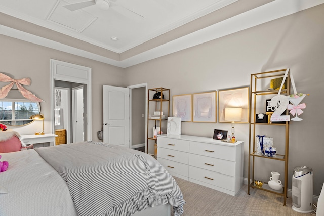 bedroom with attic access, ornamental molding, light carpet, ceiling fan, and baseboards