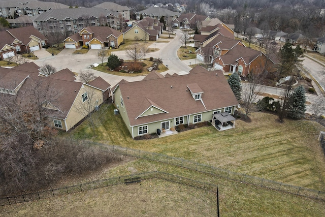 birds eye view of property with a residential view