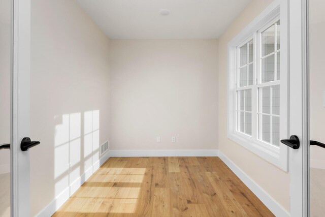 4509 Royal County Rd, Columbia, MO 65201 - unfurnished room featuring visible vents, baseboards, and light wood-type flooring