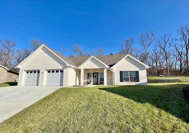 ranch-style house featuring a garage and a front yard