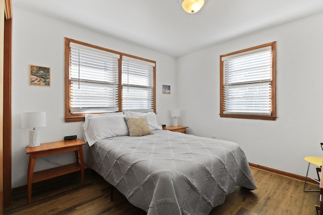 2417 Quail Dr, Columbia, MO 65202 - bedroom with dark hardwood / wood-style floors