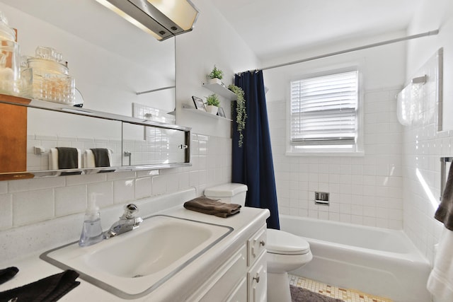 2417 Quail Dr, Columbia, MO 65202 - full bathroom featuring tile walls, backsplash, vanity, toilet, and shower / bathtub combination with curtain
