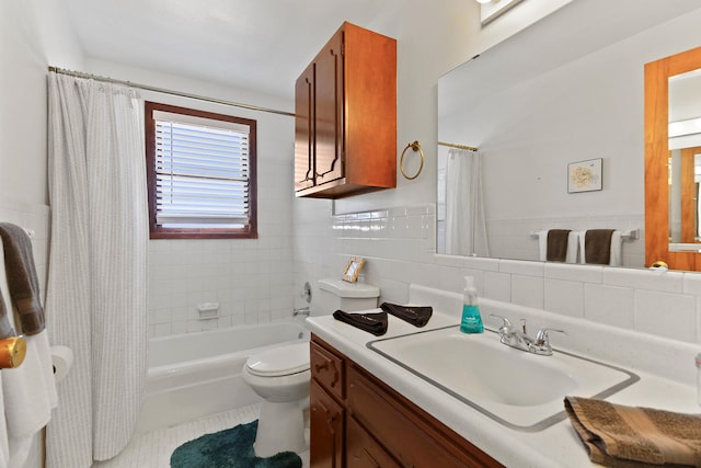 2417 Quail Dr, Columbia, MO 65202 - full bathroom featuring shower / tub combo with curtain, tile patterned floors, toilet, tile walls, and vanity