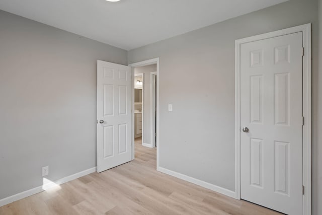 unfurnished bedroom with light hardwood / wood-style floors