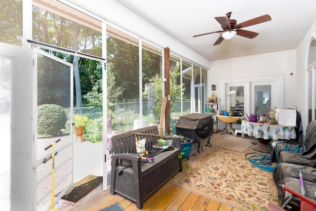 sunroom / solarium with ceiling fan