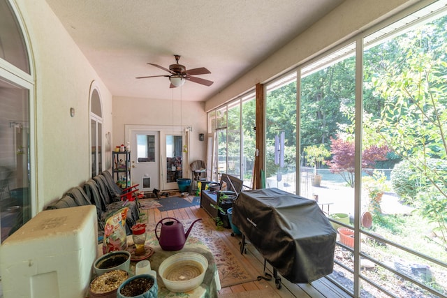 sunroom / solarium with ceiling fan