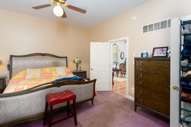 bedroom with ceiling fan and carpet flooring