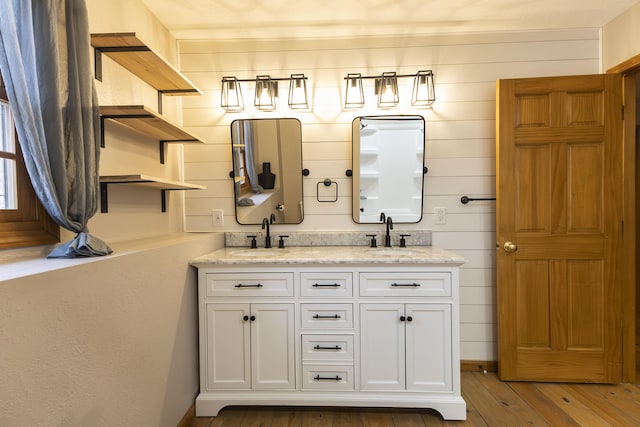 bathroom featuring vanity and wood-type flooring