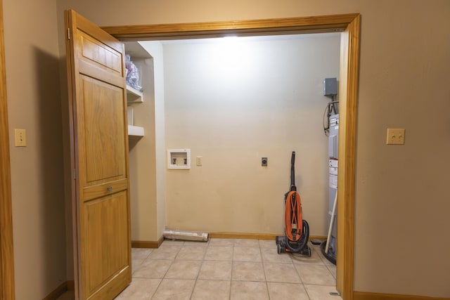 laundry room featuring hookup for a washing machine, light tile patterned flooring, and hookup for an electric dryer