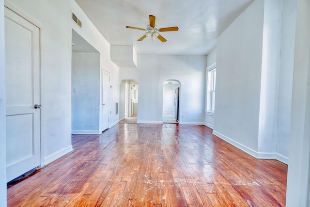 spare room featuring ceiling fan and light wood-type flooring