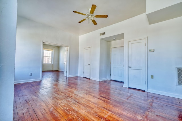 spare room featuring ceiling fan and wood-type flooring