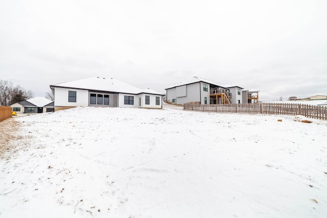 view of snow covered house