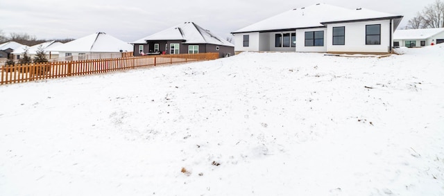 view of snow covered house