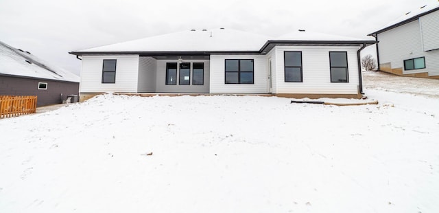 view of snow covered house