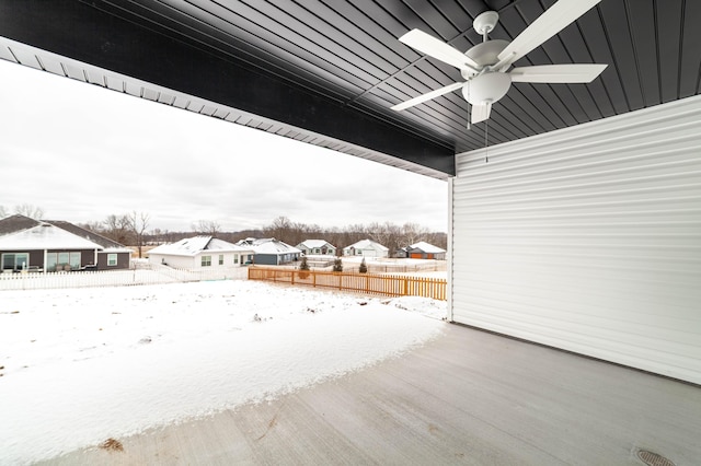 exterior space featuring ceiling fan