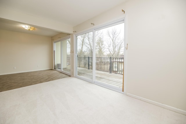 view of carpeted spare room