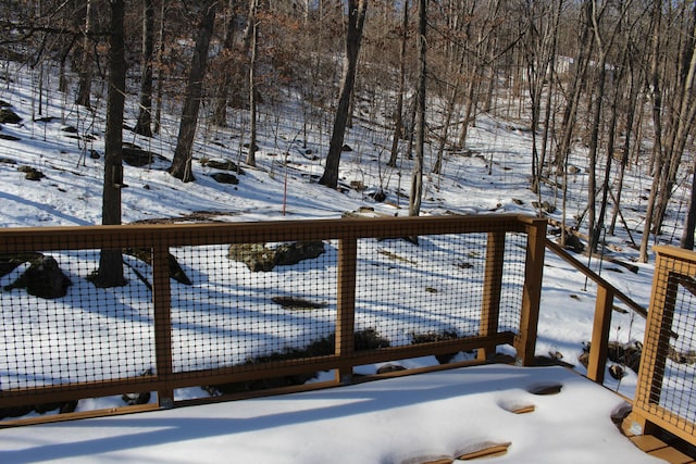 view of snow covered deck