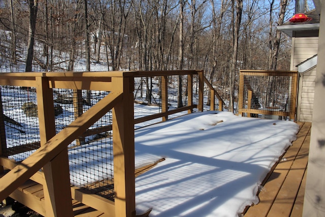 view of snow covered deck