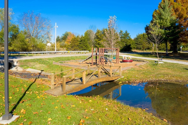 communal playground featuring a yard