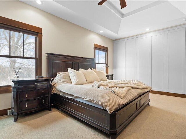 bedroom featuring ceiling fan, recessed lighting, and light colored carpet