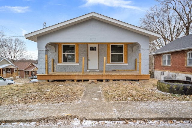 bungalow-style home featuring a porch