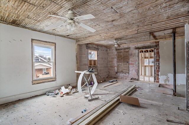 miscellaneous room featuring wooden ceiling and a ceiling fan