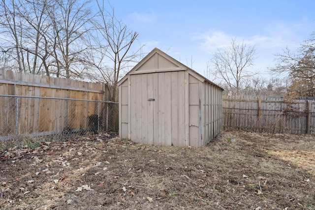 view of shed featuring a fenced backyard