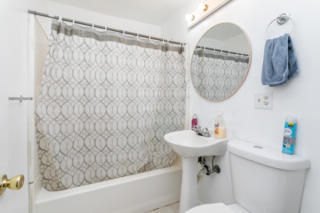 full bathroom featuring toilet and shower / bathtub combination with curtain