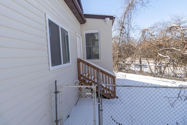 exterior space with fence and a gate