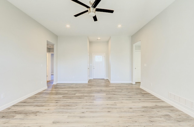 empty room featuring baseboards, recessed lighting, visible vents, and light wood-style floors